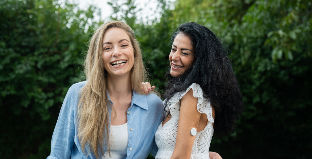 Two women smiling — women’s metabolic health whitepaper